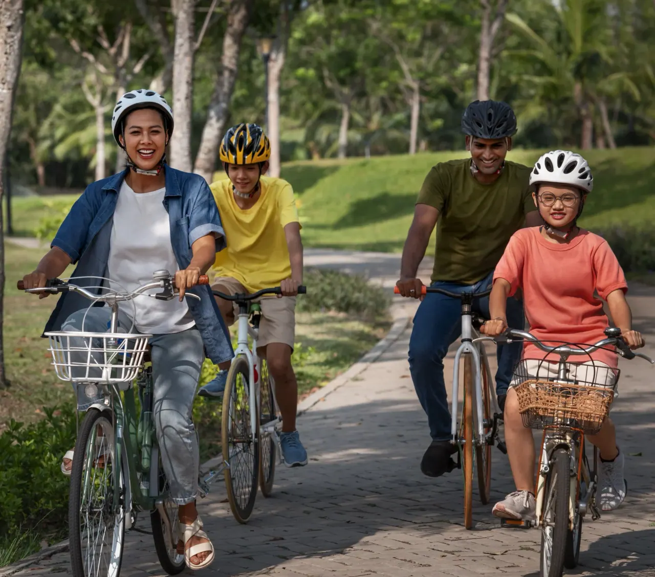A family cycling outdoors at Co-Op City @ Rawang